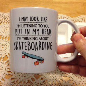 Humorous coffee cup, thinking of skateboarding